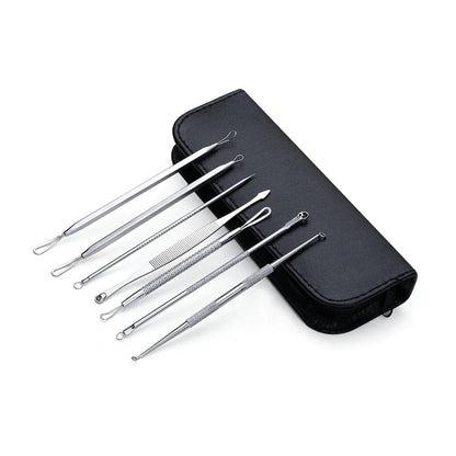 7 stainless tools laid out with black zip case